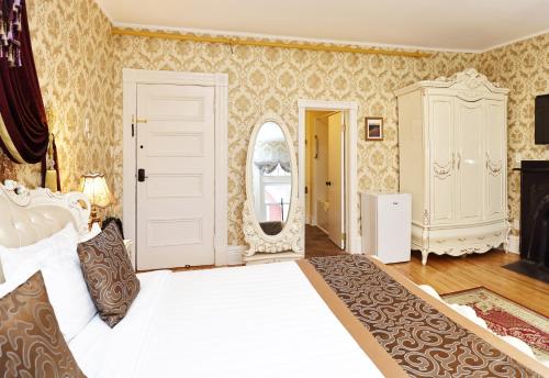 Postel nebo postele na pokoji v ubytování Prince inn