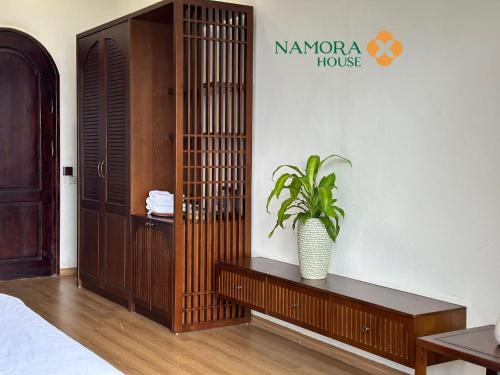 Ένα ή περισσότερα κρεβάτια σε δωμάτιο στο Namora House KG Kết Nối