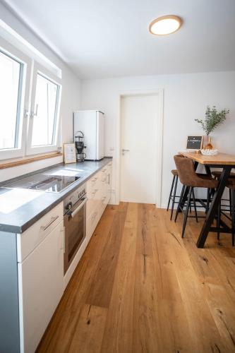 Kuchyň nebo kuchyňský kout v ubytování Studio Apartment in Weinstadt