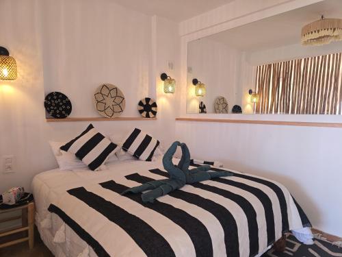 A bed or beds in a room at Studio Taghazout