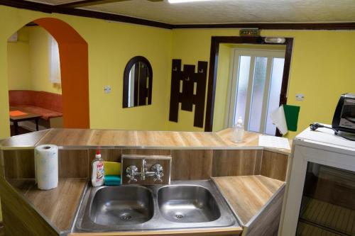 Kuchyň nebo kuchyňský kout v ubytování Апартамент "Цвети"