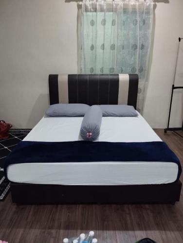 En eller flere senge i et værelse på Desa