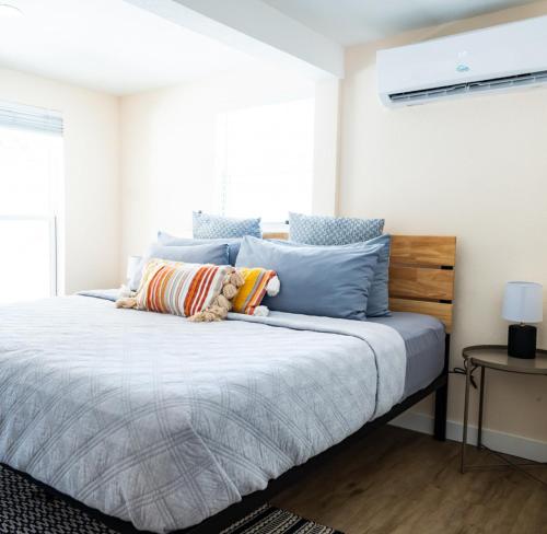 Voodi või voodid majutusasutuse Coastal Bungalow toas