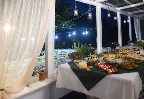 a buffet line with food on a table at Al Passo di Thalia in Ricadi