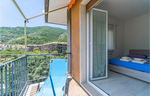 a balcony with a view of a mountain at Stunning Apartment In Recco With Wifi in Recco