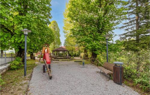 a statue of a man riding a skateboard in a park at 2 Bedroom Lovely Apartment In Fuzine in Fužine