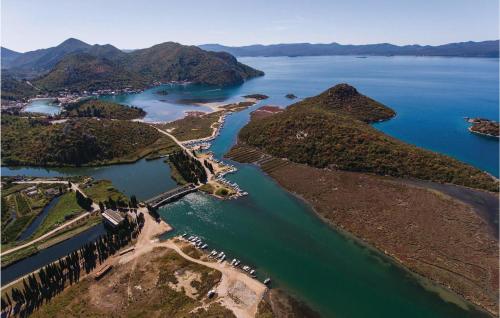 an aerial view of a river between two islands at Apartment Blace With Sea View Xiii in Blace