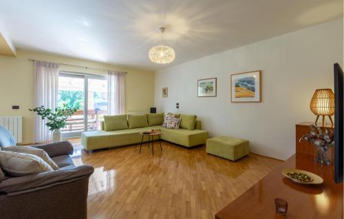 a living room with a couch and a table at Holiday Home Pazin 07 in Pazin
