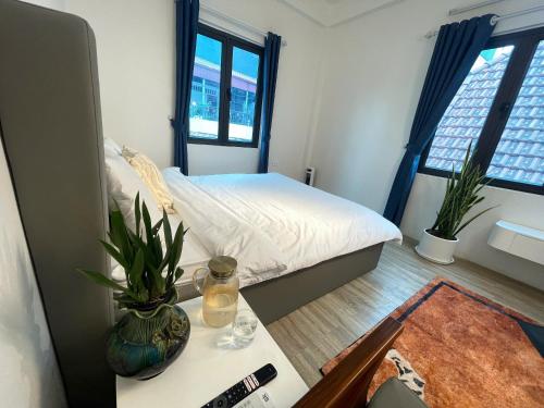 Ein Bett oder Betten in einem Zimmer der Unterkunft CHARM CHARM - kimmy housing - 48 To Ngoc Van