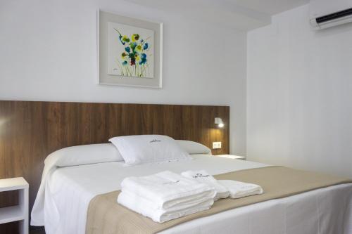 Postel nebo postele na pokoji v ubytování Alén de Louro - Apartamento 1 San Francisco