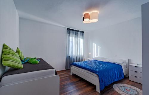 Ένα ή περισσότερα κρεβάτια σε δωμάτιο στο 2 Bedroom Lovely Apartment In Vela Luka