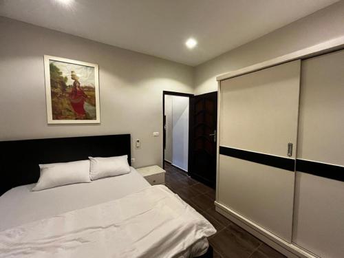 Postel nebo postele na pokoji v ubytování Sadam luxury Guest House
