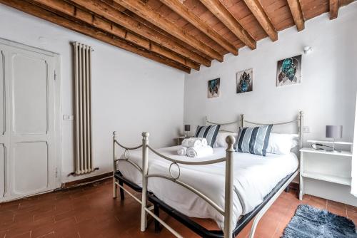 Katil atau katil-katil dalam bilik di Hoslty-Suite l'Arancio-Enjoy the Historical Center