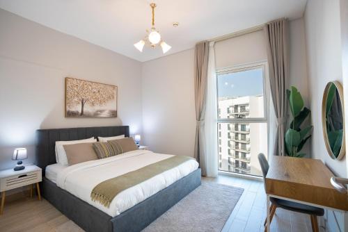 Ένα ή περισσότερα κρεβάτια σε δωμάτιο στο Yas Winter Dreamstay 1bhk