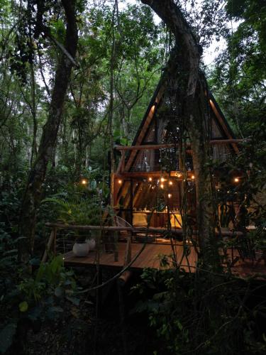 a tree house in the middle of the forest at Bosque Veneza in Nova Veneza