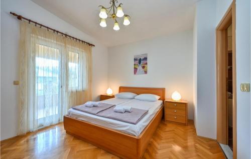 Ένα ή περισσότερα κρεβάτια σε δωμάτιο στο Awesome Home In Pag With Wifi