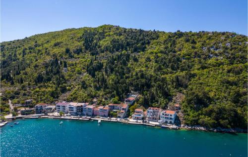an aerial view of a resort on a lake at Lovely Home In Blace With Sauna in Blace