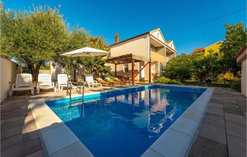 Four-Bedroom Holiday Home In Vrsi