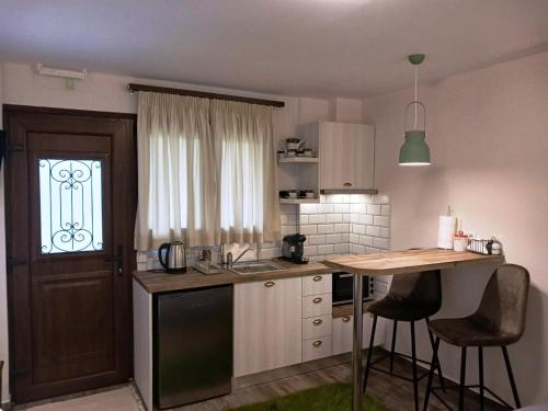 Kuchyň nebo kuchyňský kout v ubytování GOURA House