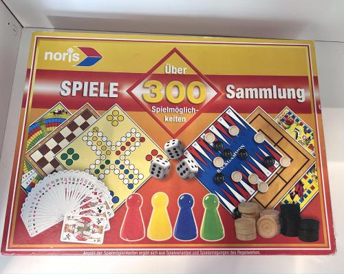 a toy board game in a box with some items at Ferienwohnung Goltan - Zentral - Küche - WIFI in Abensberg
