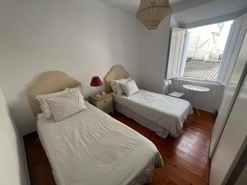 En eller flere senge i et værelse på La Plaza II