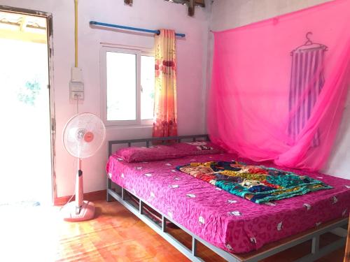 Een bed of bedden in een kamer bij Abu Sea Man House