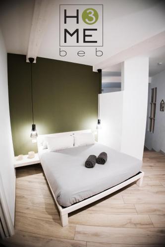 Ένα ή περισσότερα κρεβάτια σε δωμάτιο στο HOME 3 BED Aparthotel