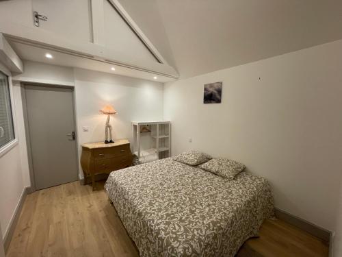 Postel nebo postele na pokoji v ubytování Gîte des falaises de champeaux