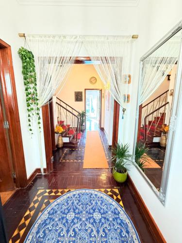 Ένα ή περισσότερα κρεβάτια σε δωμάτιο στο Happy Sintra Inn