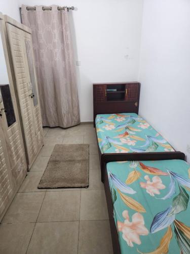 Llit o llits en una habitació de عجمان ديوان