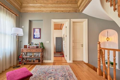 a living room with a wooden ceiling at Nostalgic & Comfortable Historical Home! in Istanbul