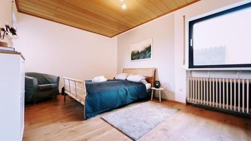 Postel nebo postele na pokoji v ubytování Apartment Naturblick Hollywood
