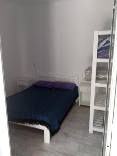 Postel nebo postele na pokoji v ubytování Aujo