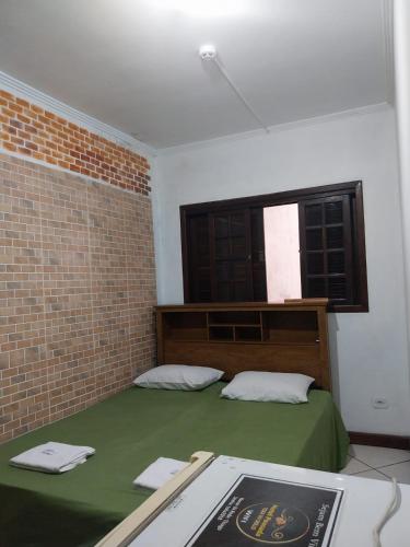 Postel nebo postele na pokoji v ubytování Hotel Toka do Skillo