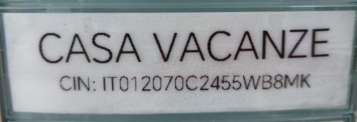 a sign with the name of a car dealer at Appartamento dei Salici in Gallarate