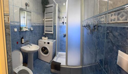 Kúpeľňa v ubytovaní Apartament KOMPAS