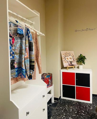a walk in closet with a white dresser at Casa di Patty - Centro Storico in Asti