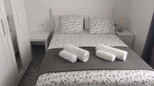 Postel nebo postele na pokoji v ubytování BNB LOLA - Habitacion privada - Aire acondicionado - Baños compartidos