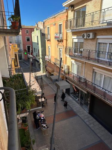 an overhead view of a city street with buildings at C'Anne Marie in Palafrugell