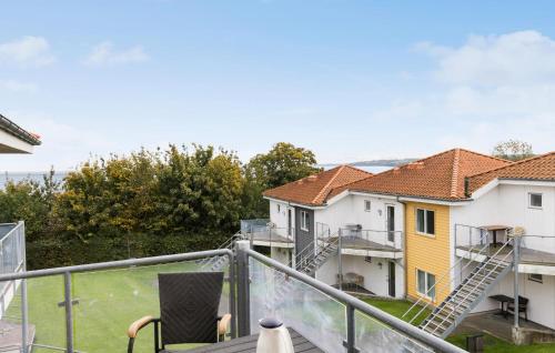 a view from the balcony of a house at Gudhjem Søpark Lejl 18 in Gudhjem