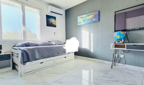 Ένα ή περισσότερα κρεβάτια σε δωμάτιο στο Suite lit double