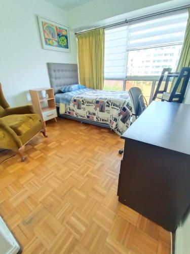Posezení v ubytování Habitaciones, 6 norte con San Martin con baño compartido