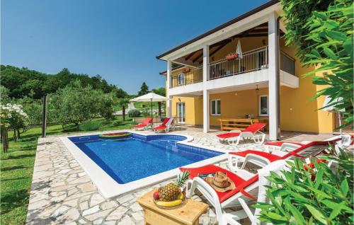 an image of a villa with a swimming pool at Holiday Home Kranjci Kranjci in Raša