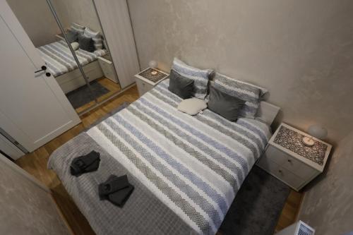 Postel nebo postele na pokoji v ubytování Vidra apartman