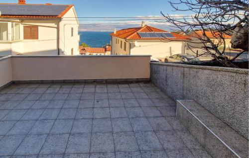 a view from the balcony of a house at 1 Bedroom Beautiful Apartment In Vrbnik in Vrbnik