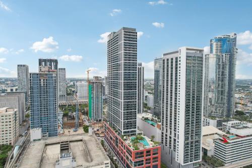 an aerial view of a city with tall buildings at Stunning Lux 2 Bed 2 Bath with Panoramic View from Balcony in Miami