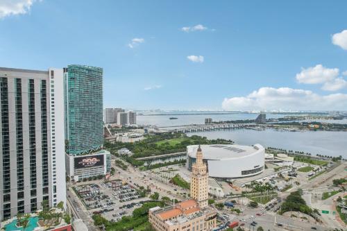 an aerial view of a city with a river and buildings at Stunning Lux 2 Bed 2 Bath with Panoramic View from Balcony in Miami