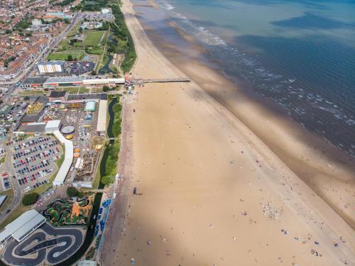 an aerial view of a beach with crowds of people at Superb 8 Berth Caravan At Southview Holiday Park Near Skegness Ref 33027Tc in Skegness