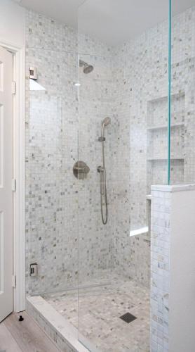 a shower with a glass door in a bathroom at Montecito-Chic Beachside Retreat in Montecito