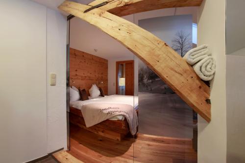 Postel nebo postele na pokoji v ubytování Landhaus Alpengruss
